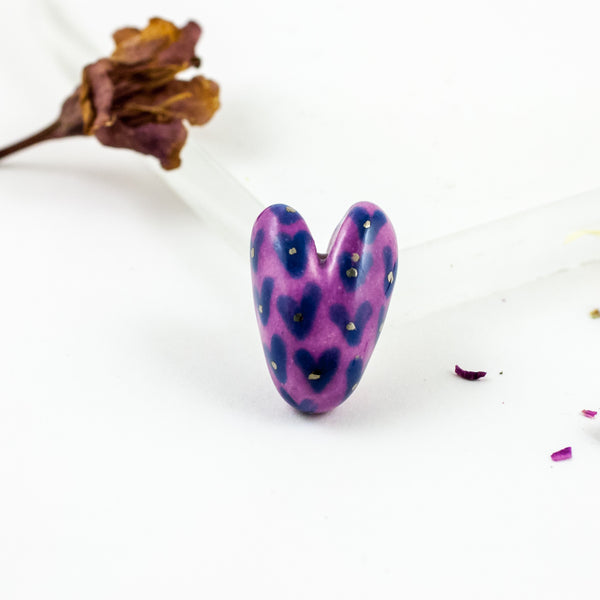 Purple color heart-shaped brooch