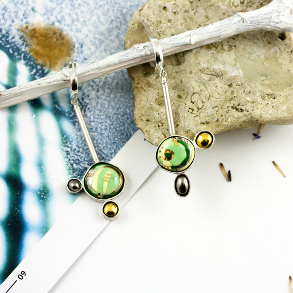 Long green dangle silver earrings
