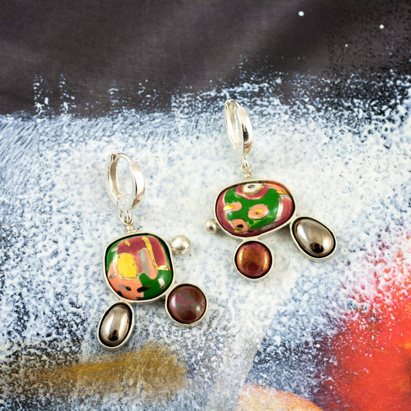 Green and burgundy color dangle earrings with spots