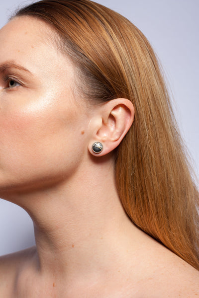 Round white earrings with decorated ceramics