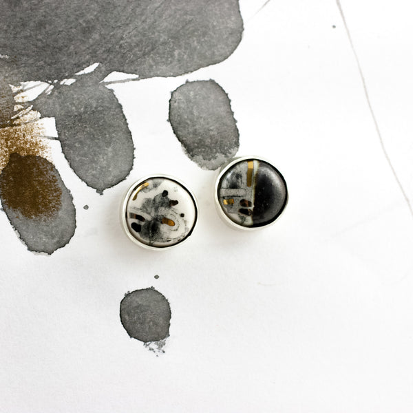 Round white earrings with decorated ceramics