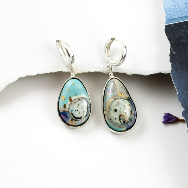 BON BON blue dangle earrings  decorated with graphic drawings