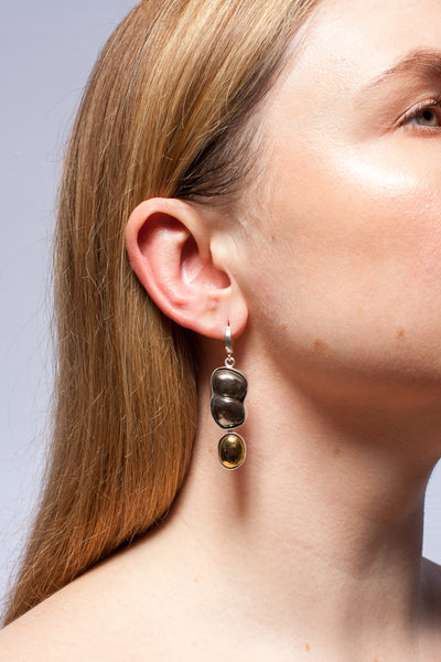Dangle black mismatched earrings with gold luster