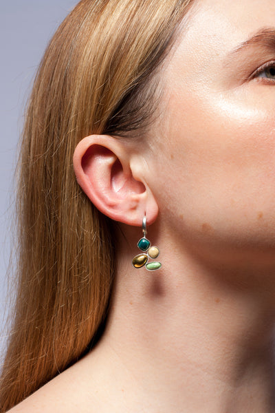Green shades dangle earrings with gold luster