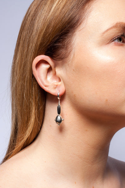 Long black dangle earrings with platinum luster