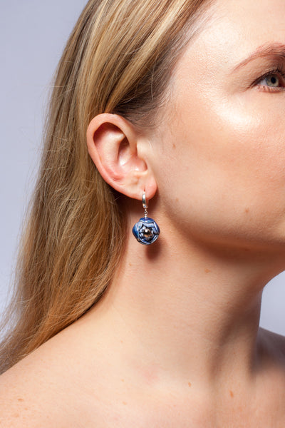 Blue dangle flower earrings with platinum