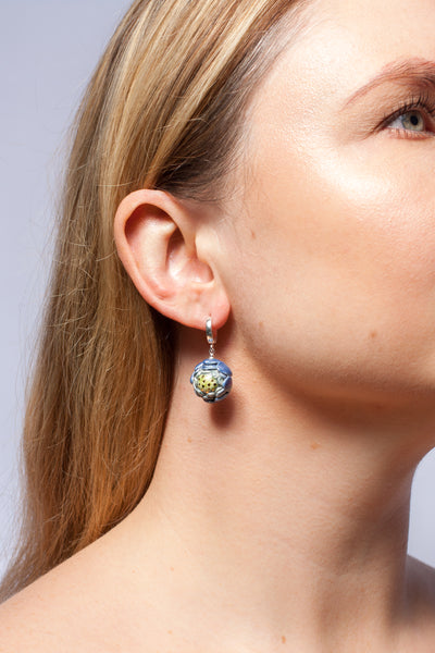 Blue flower earrings with gold luster