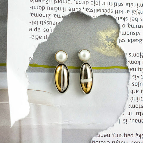 Gold and platinum color form earrings with pearls
