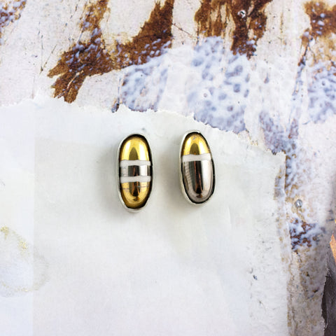 Mismatched earrings with platinum and gold luster