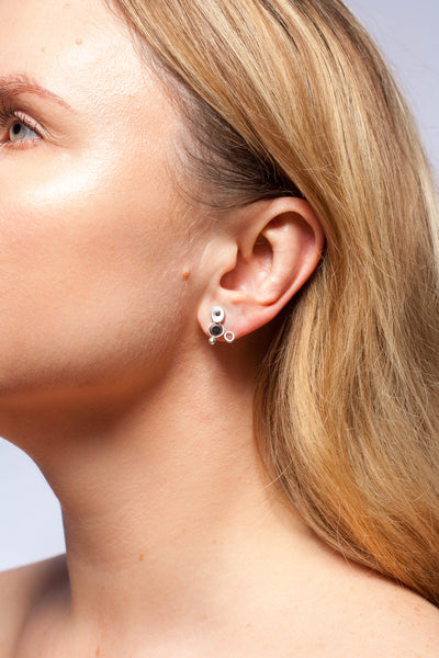 Dark brown mismatched earrings with blackened silver