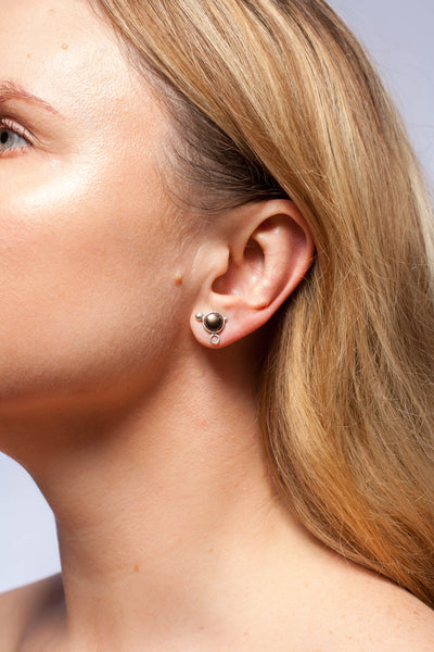 Dark brown mismatched earrings with blackened silver