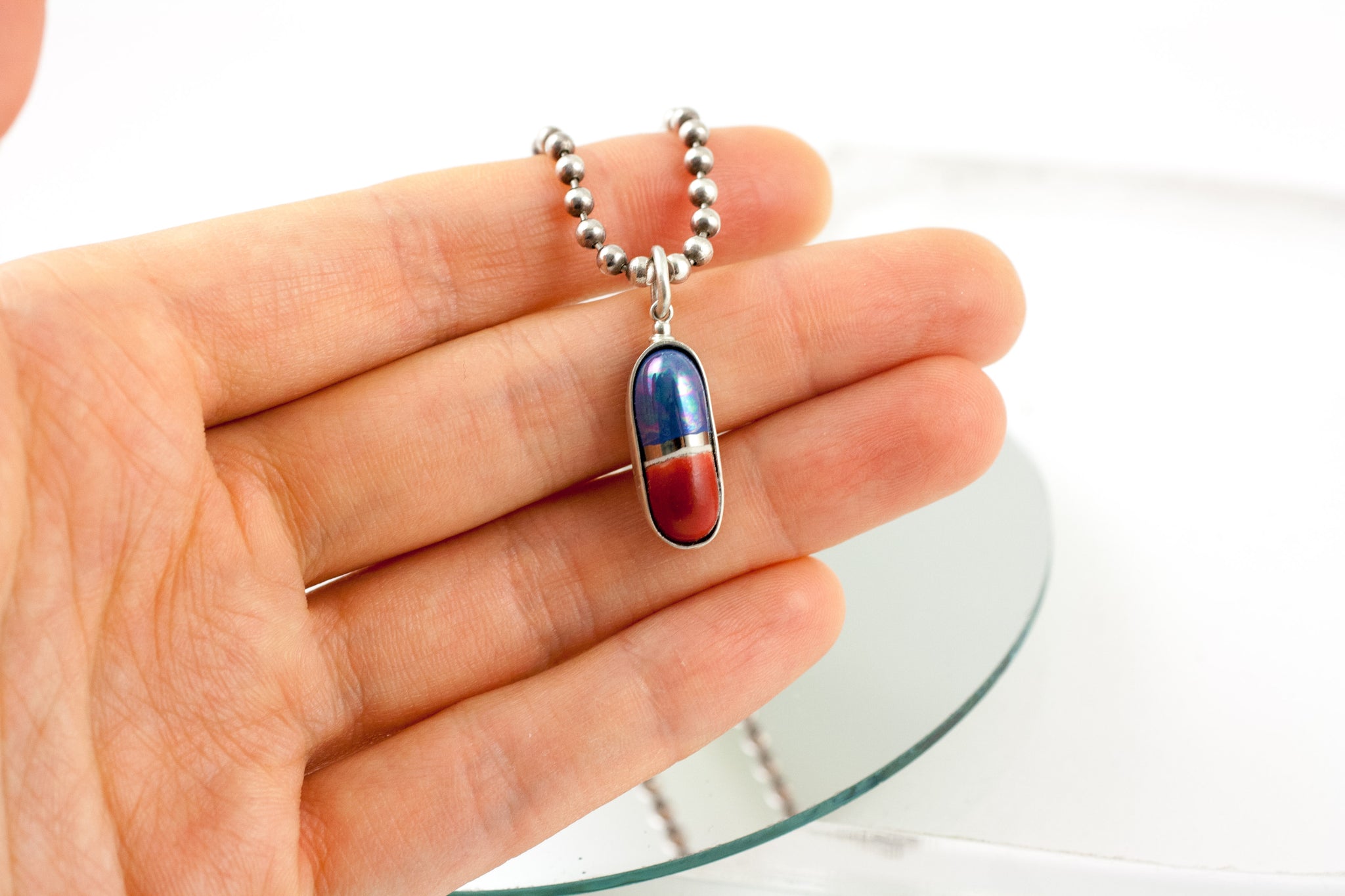 Red and blue ceramic pendant