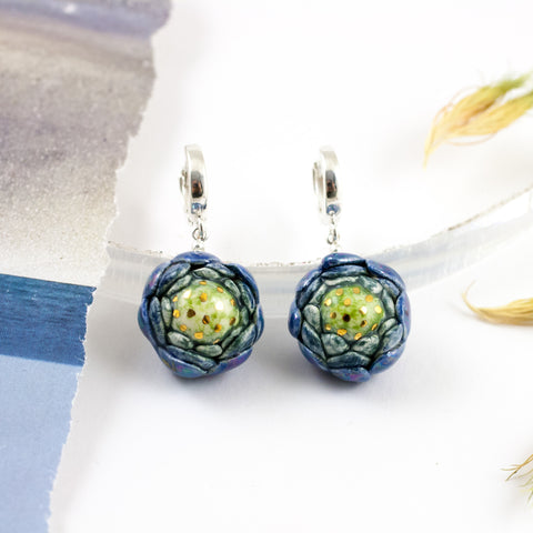Blue flower earrings with gold luster