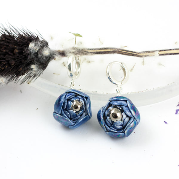 Blue dangle flower earrings with platinum