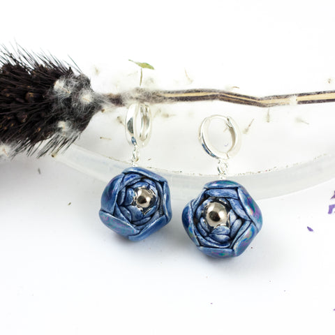 Blue dangle flower earrings with platinum