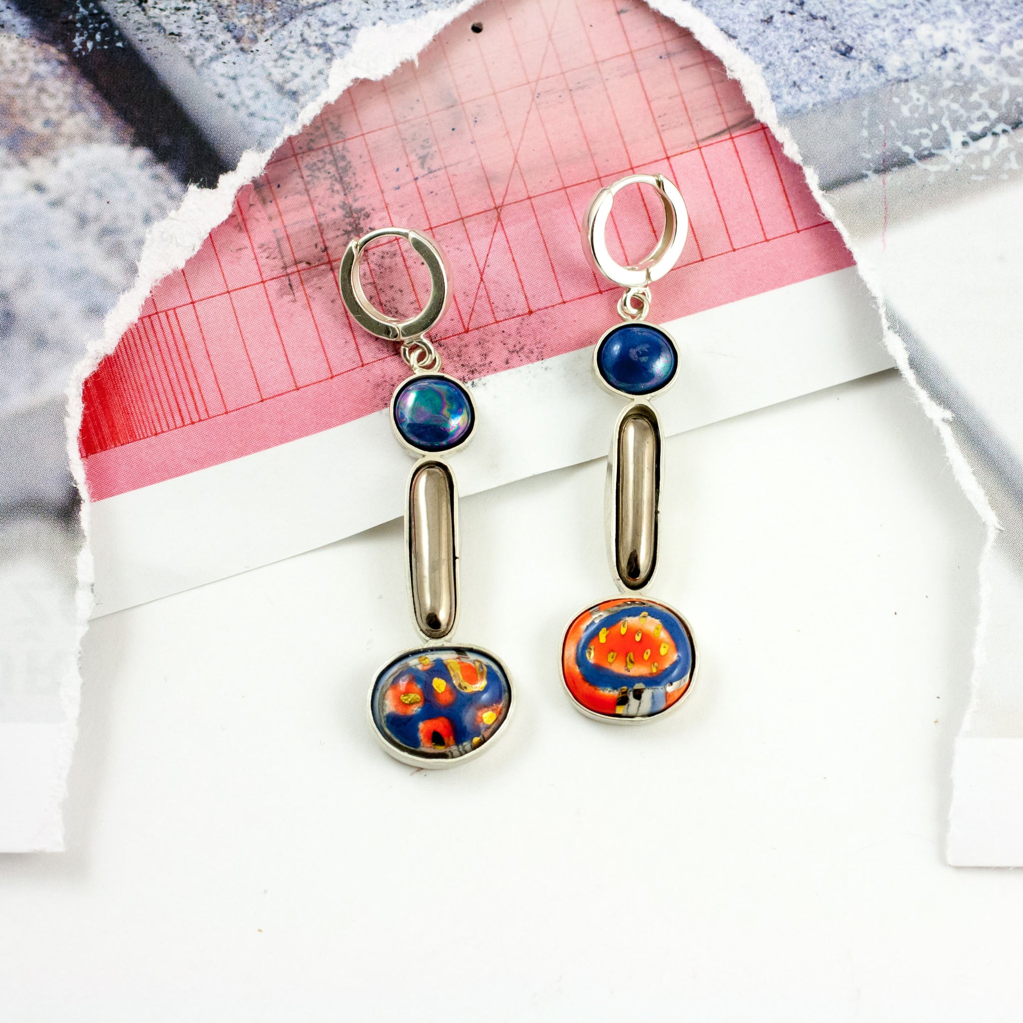 Long blue and red dangle earrings with dots and platinum luster