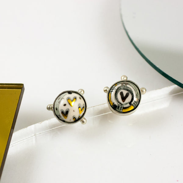 White mini BON BON earrings with gold hearts