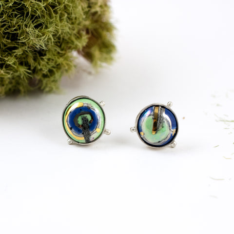 Mismatched green and blue color earrings with gold lines