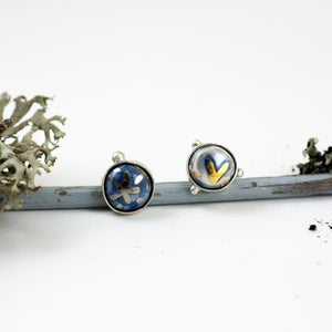Blue round earrings with platinum and gold luster
