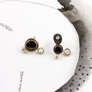 Dark brown mismatched earrings with blackened silver