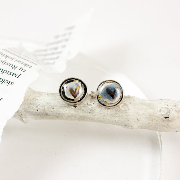 Blue mismatched silver earrings with tiny hearts