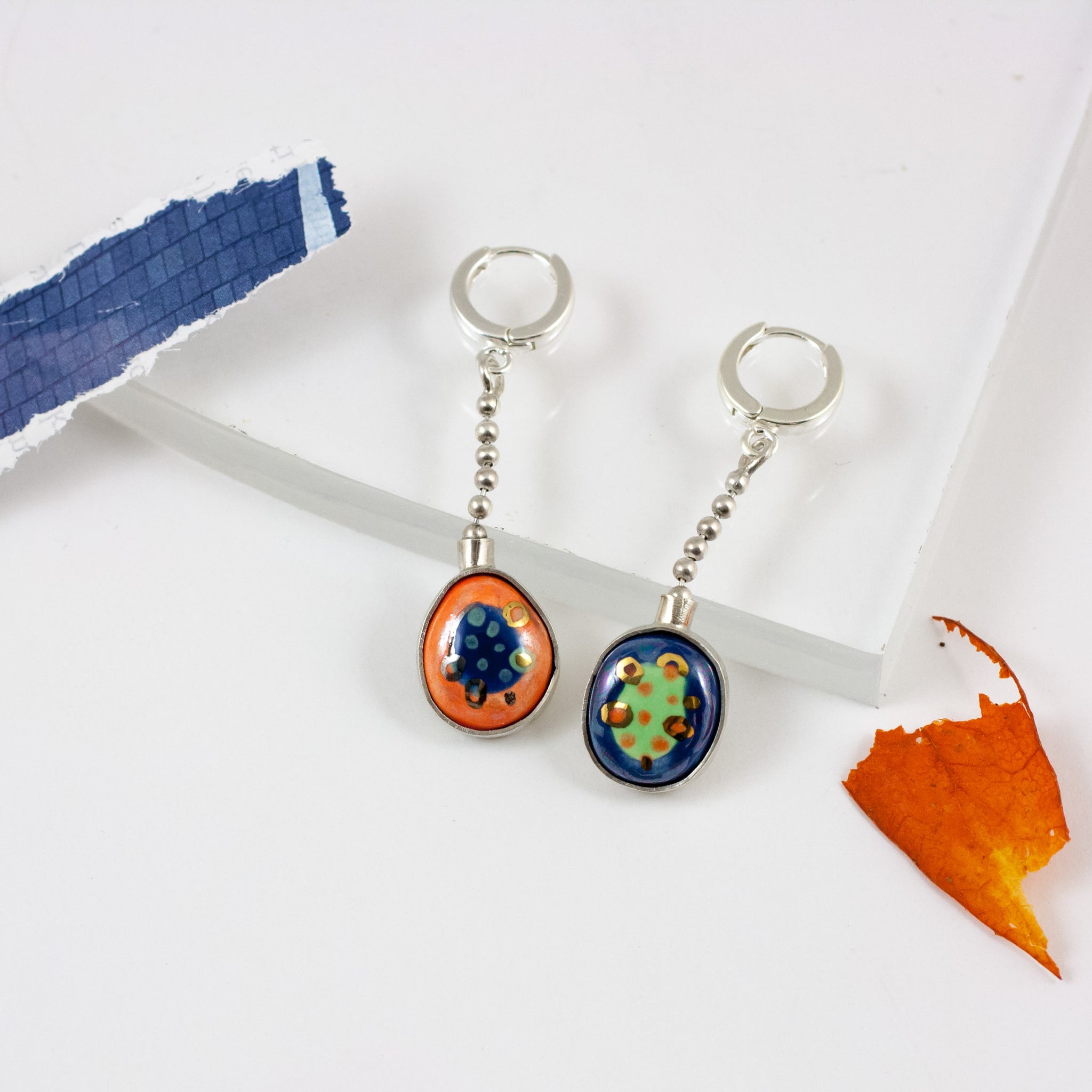 BON BON Blue and orange dangle earrings