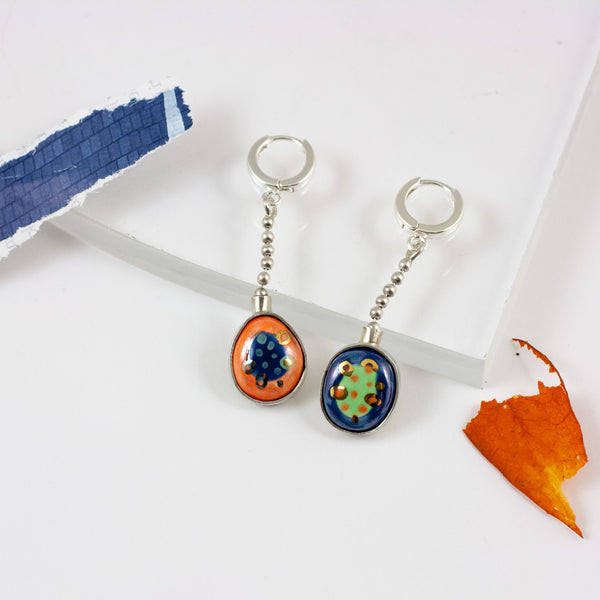 BON BON Blue and orange dangle earrings