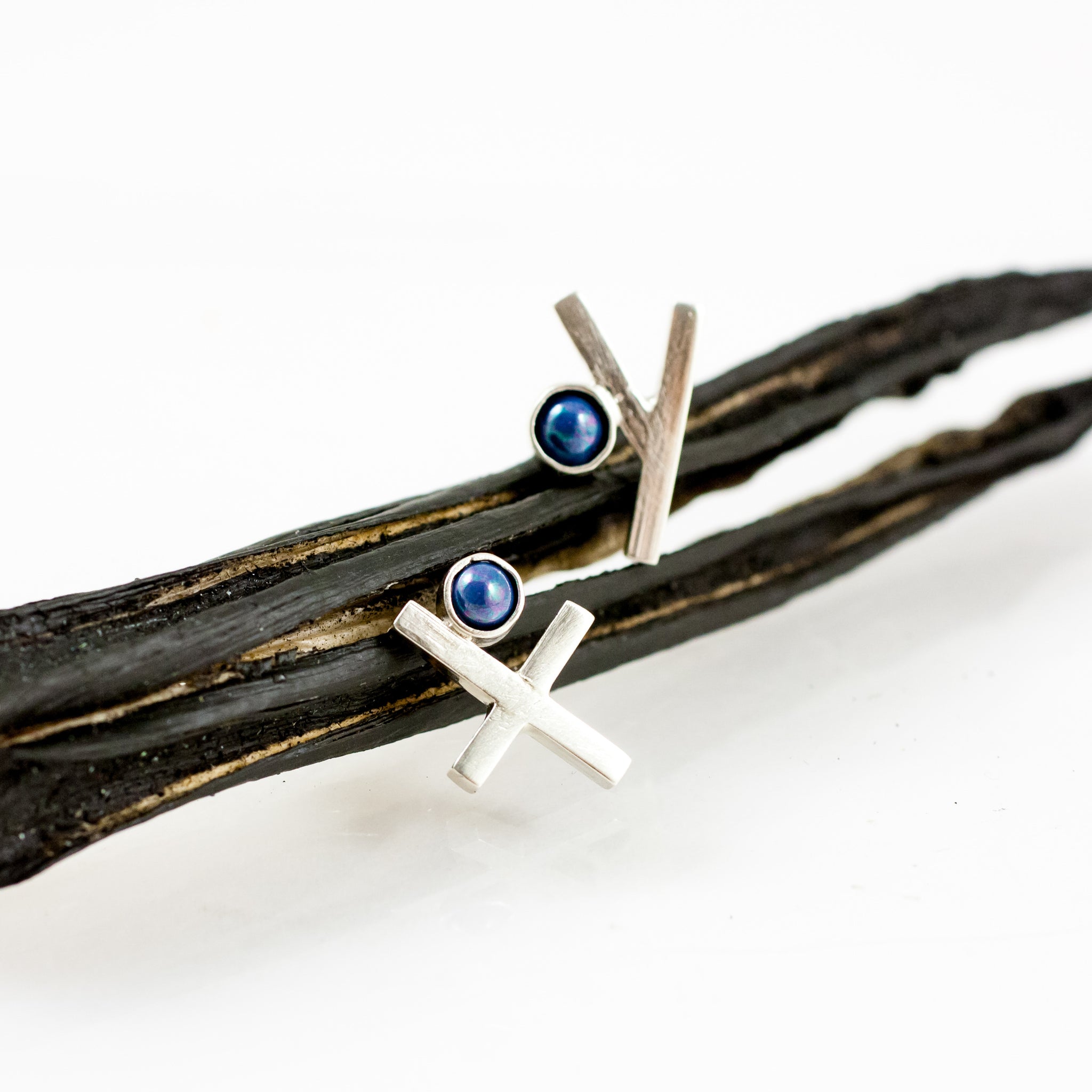 Blue asymmetrical X Y silver stud earrings