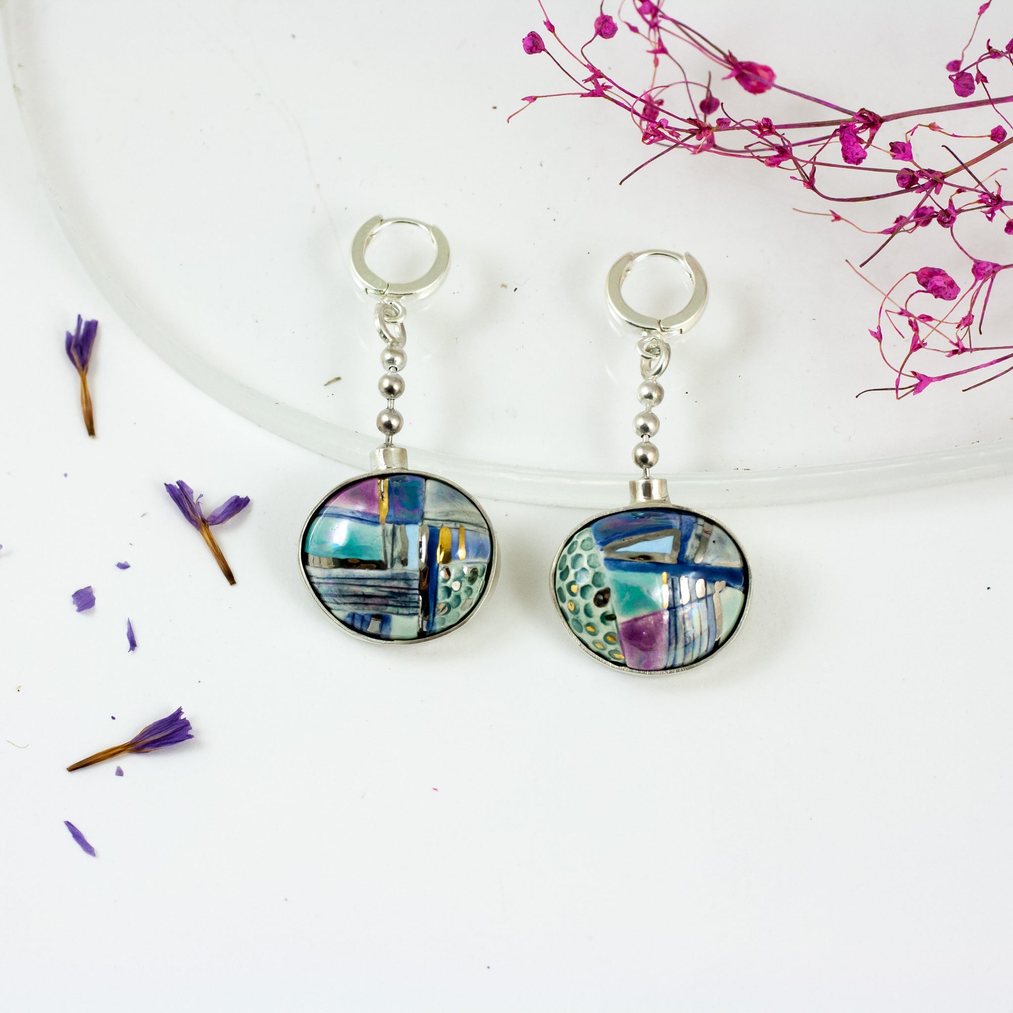 Bright blue and purple color earrings with silver clasps
