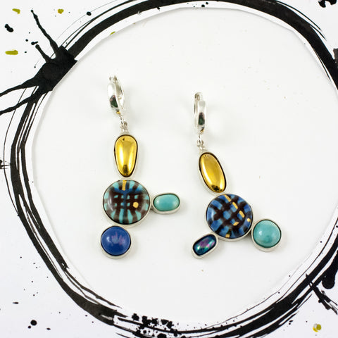 Bright blue and gold color earrings with silver clasps