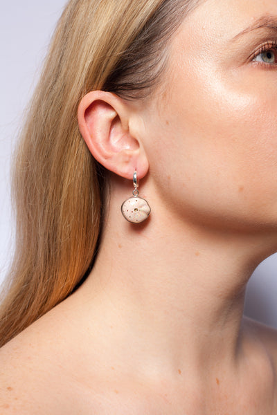 Pink dangle silver earrings with gold-plated ceramics