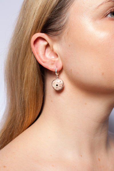 Pink dangle silver earrings with gold-plated ceramics