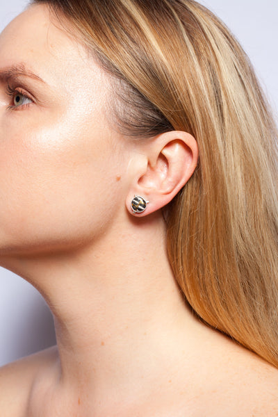 ABSTRACT Mismatched earrings witch gold luster