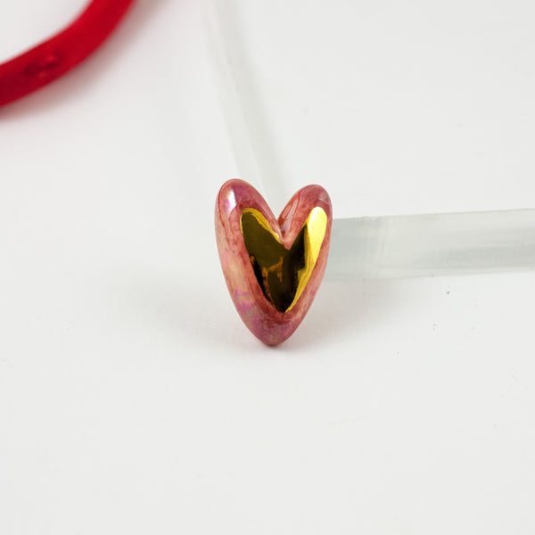 Pink heart-shaped brooch with pearl and gold lusters