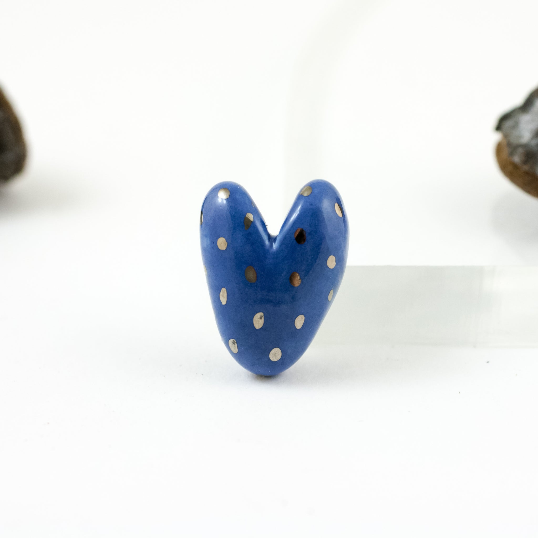 Marine blue heart-shaped brooch with platinum luster dots
