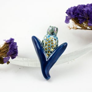 Blue organic ceramic brooch with gold color dots