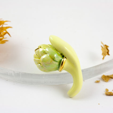 Yellow organic brooch with pearl luster