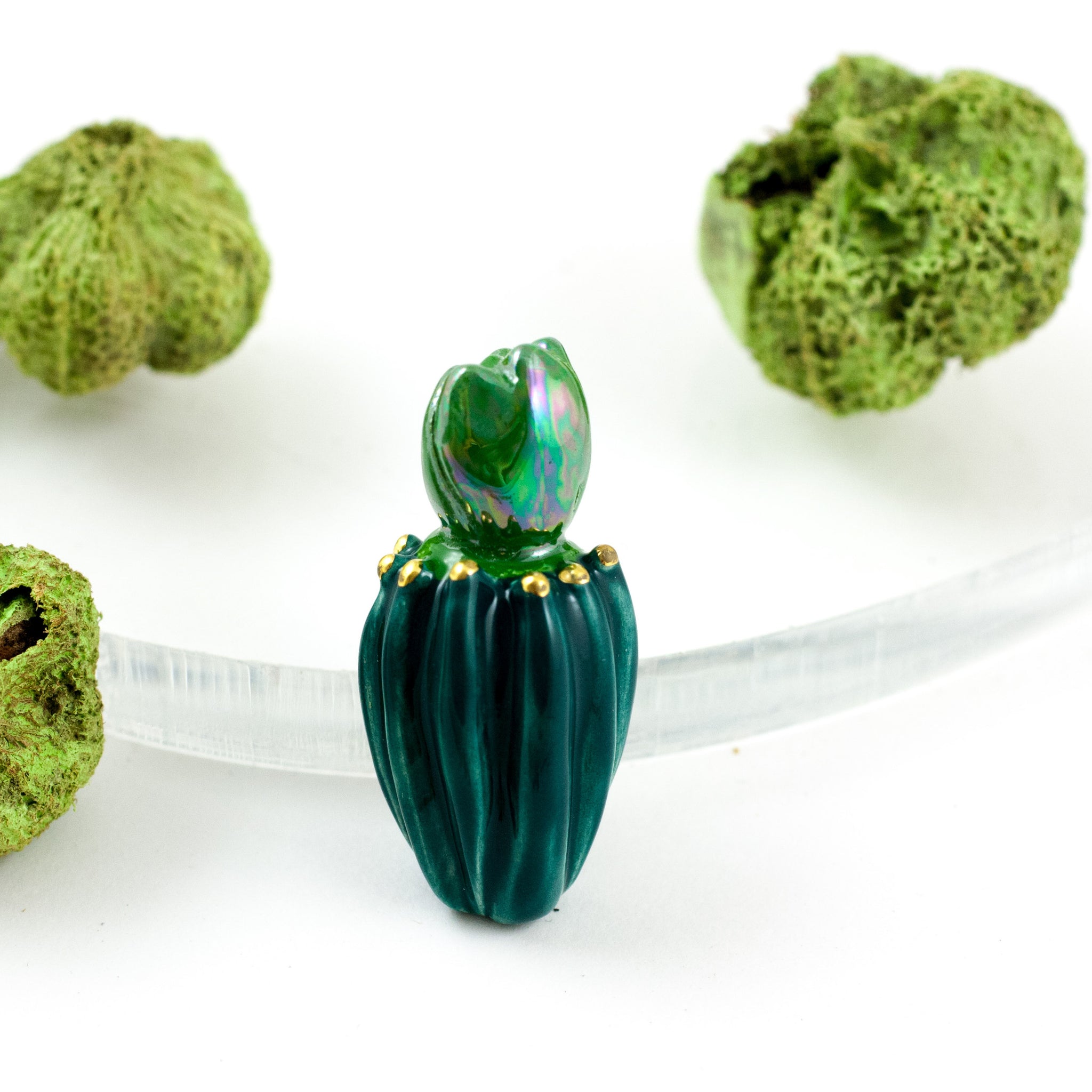 Green flower form ceramic brooch with dots