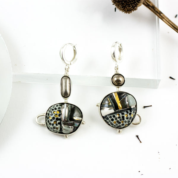 Melni un balti pakaramie auskari ABSTRACT ar platīna detaļām