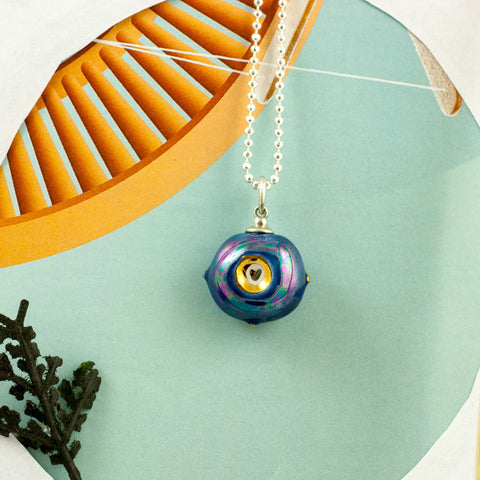 Blue ceramic pendant with pearl luster