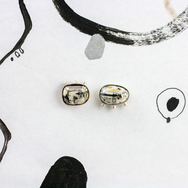 ABSTRACT Mismatched mini ceramic earrings
