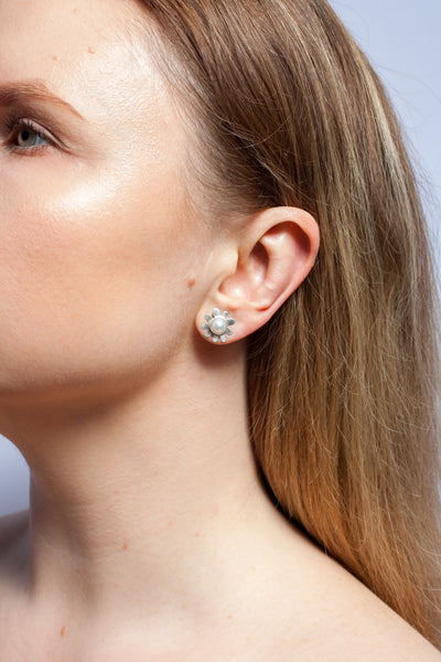 Silver stud earrings with white round freshwater pearls
