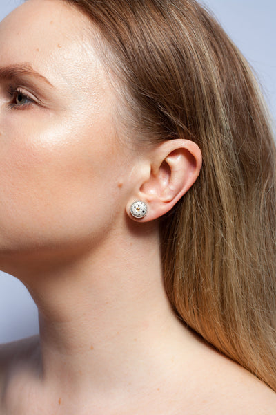 ABSTRACT White speckled mini stud earrings with lusters