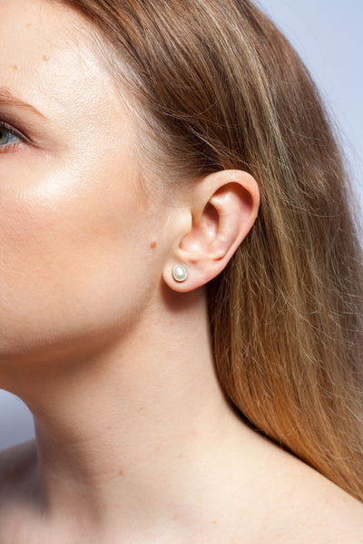 Simple silver stud earrings with freshwater pearls