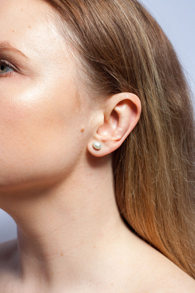 Simple silver stud earrings with freshwater pearls