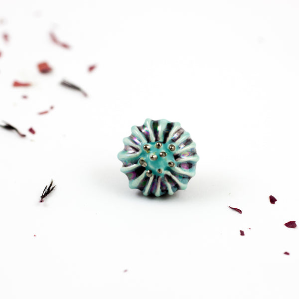 Organic shape baby blue color brooch with pearl luster