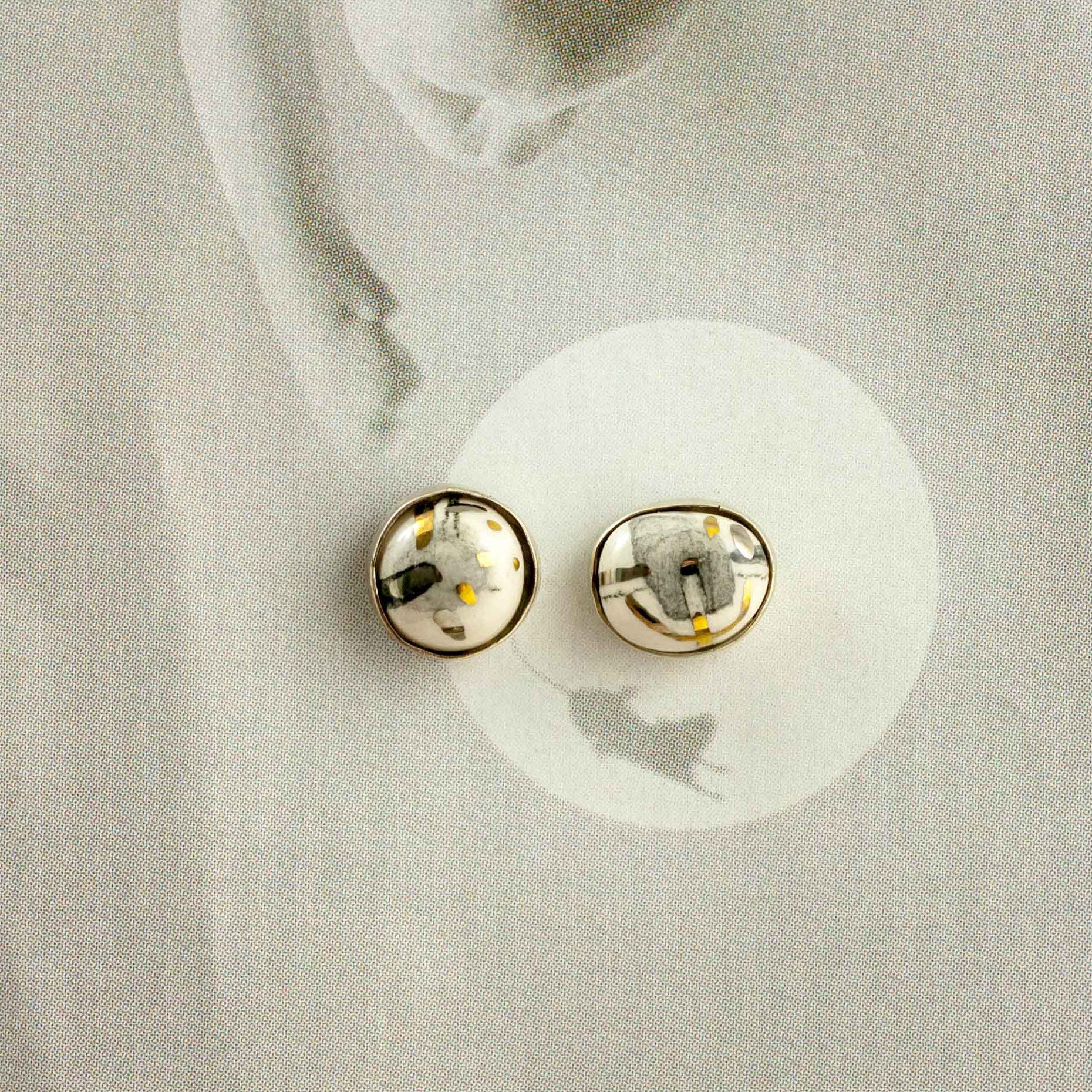 White ABSTRACT earrings with gold decor