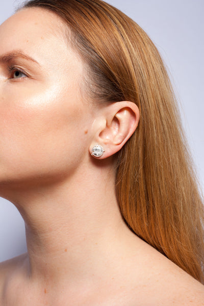 White and black mismatched silver earrings ABSTRACT