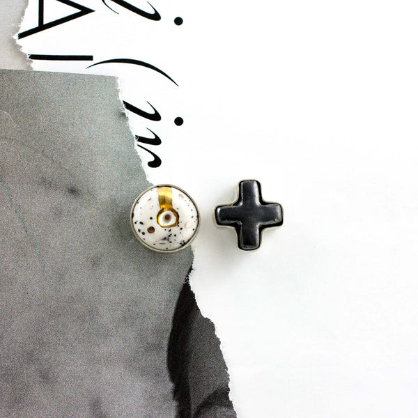 White and black mismatched ceramic earrings ABSTRACT