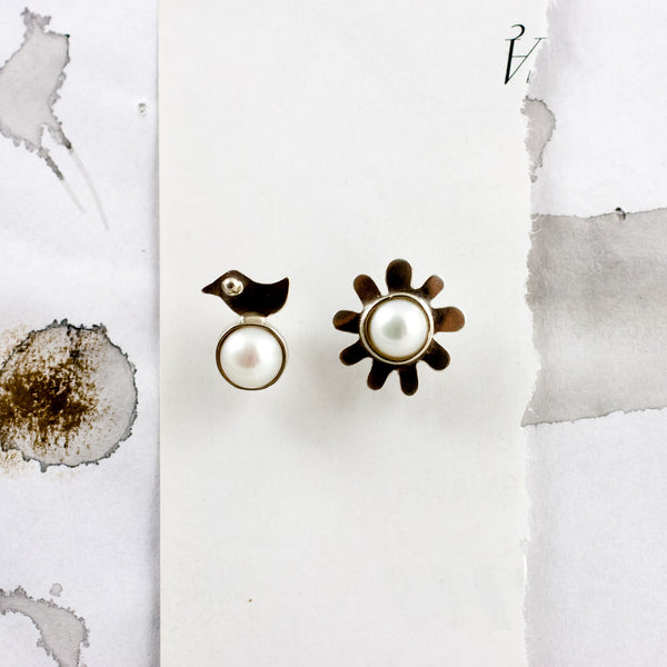 Silver stud earrings with white round freshwater pearls